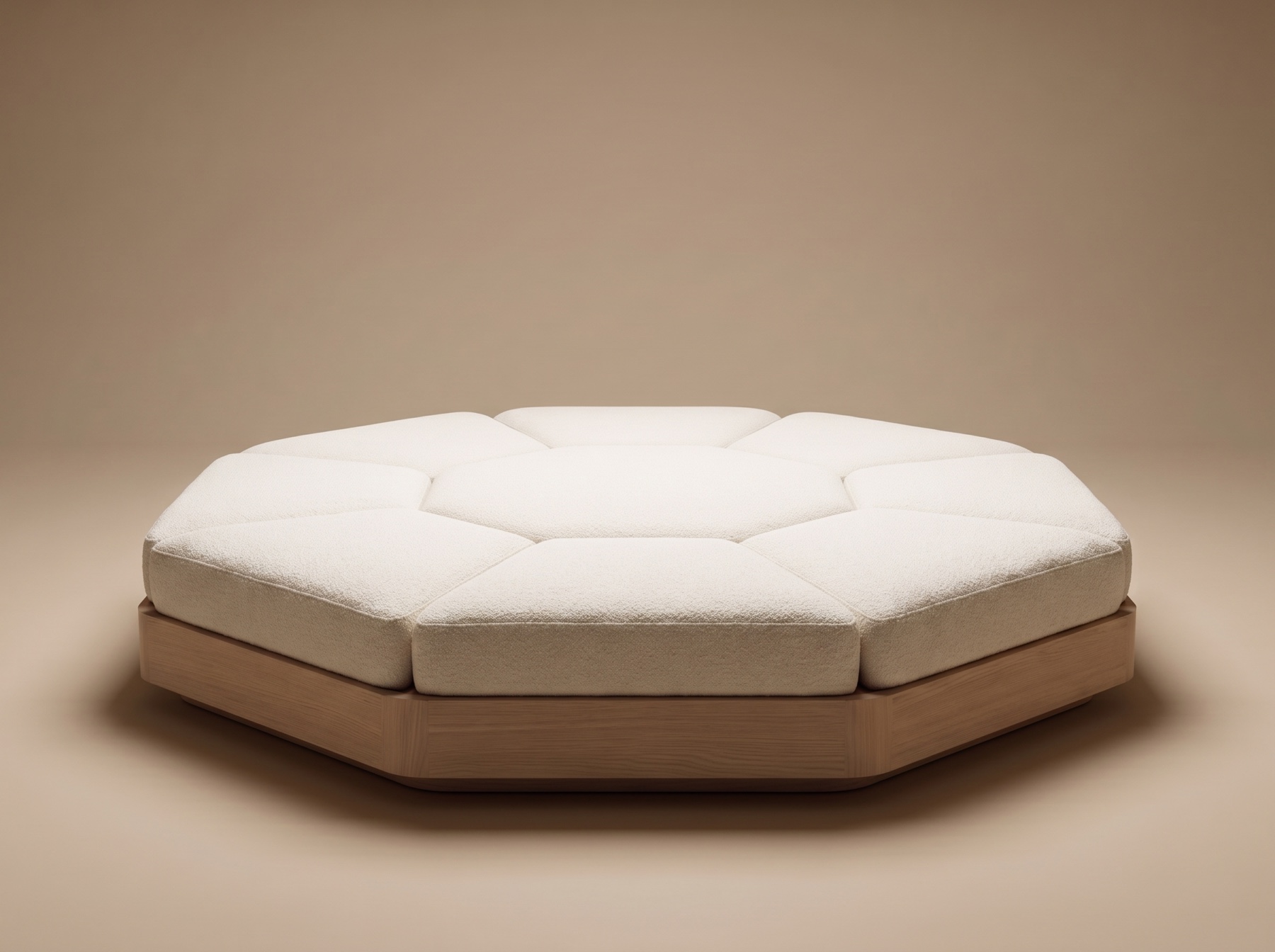 AVA, the audio visual artifact: the octagon haptic platform in bone upholstery on an oak base, photographed alone on a plain warm ground.